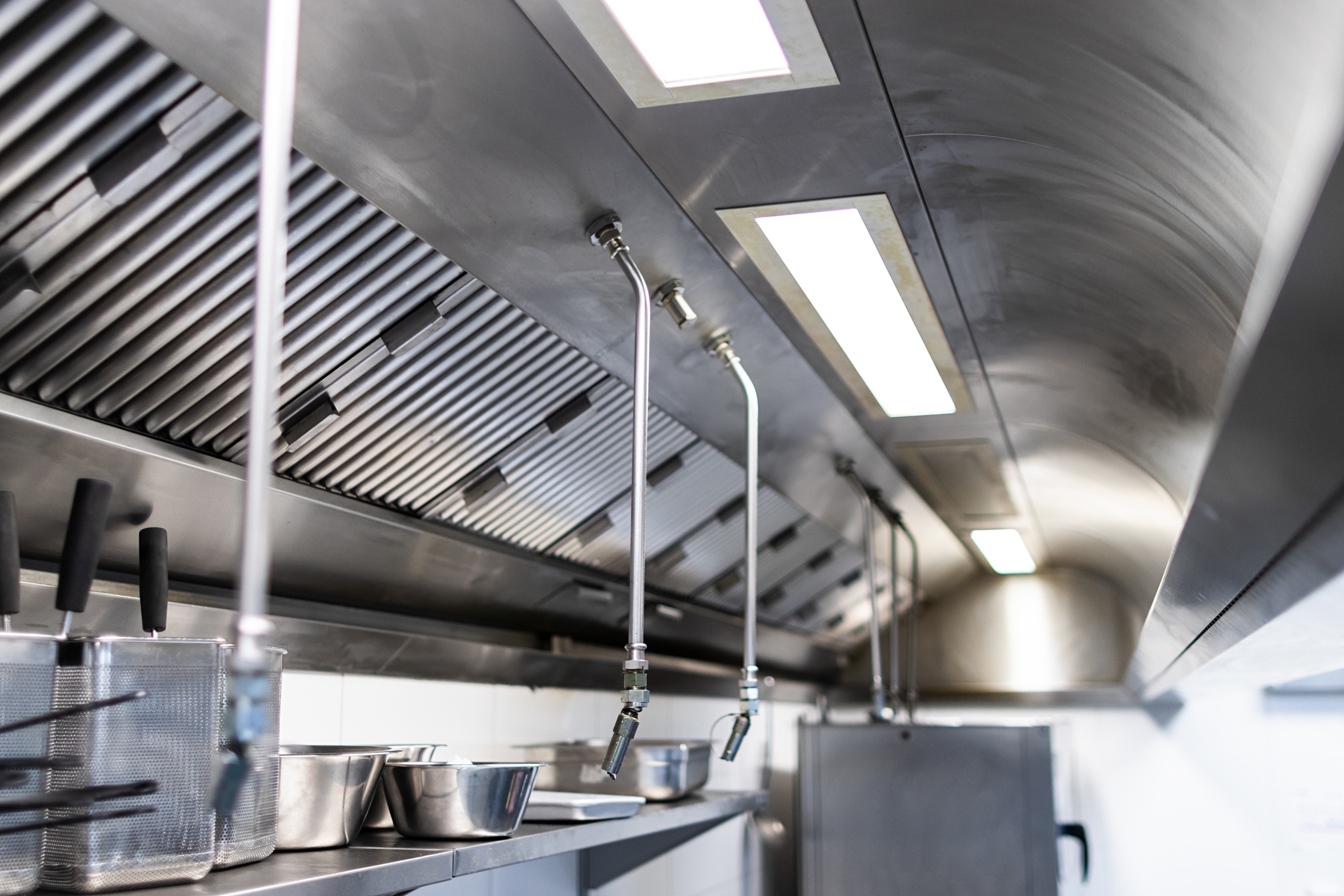 How a Commercial Hood Fire Suppression System Protects Your Kitchen and Staff